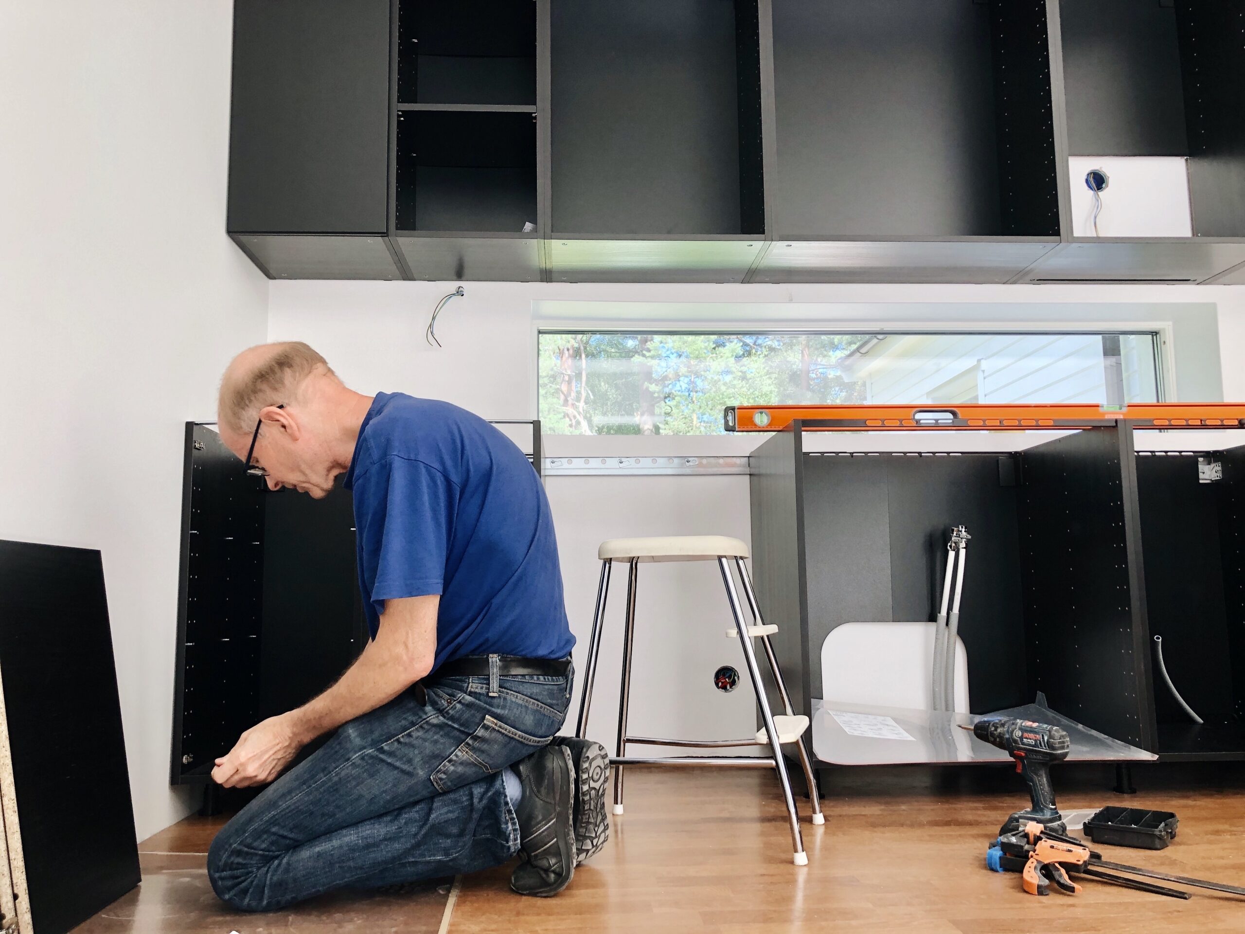 KB Better Construction crew performing high-end kitchen installation in Emerald Park