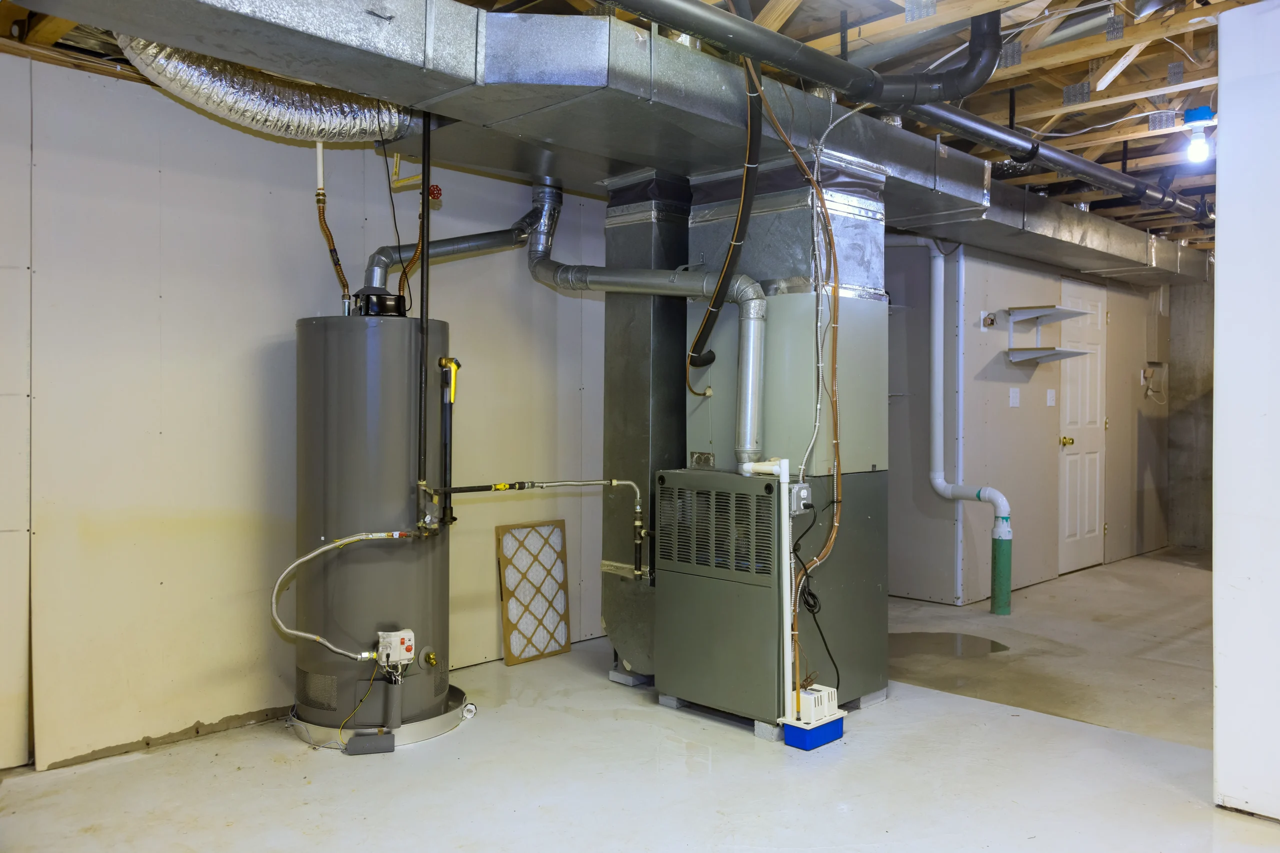 KB Better Construction industrial water extraction equipment in a large Emerald Park basement