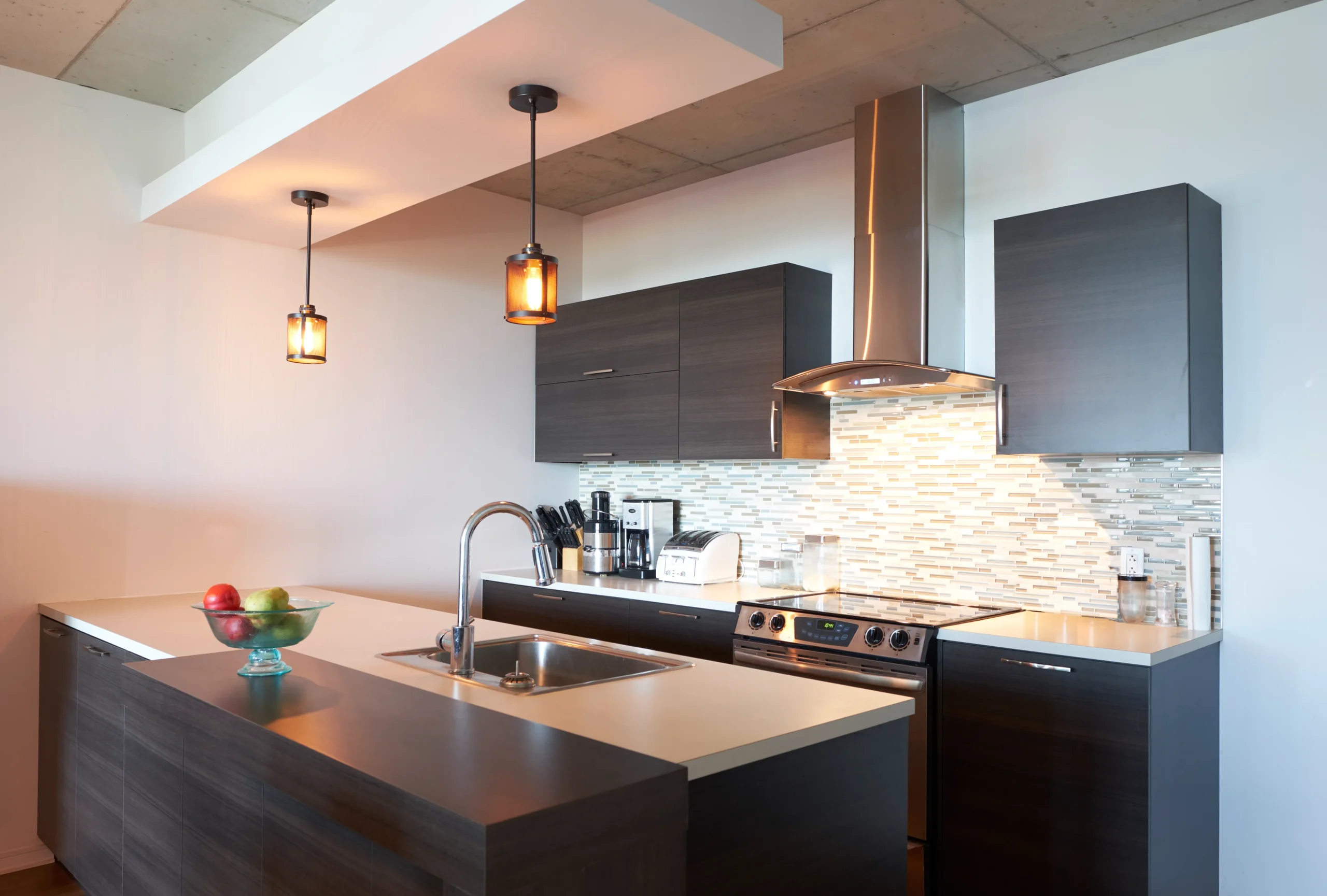 Renovated Regina rental suite kitchen with updated cabinetry